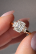 Yellow Gold Emerald Cut Three Stone Engagement Ring
