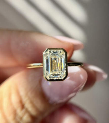 Yellow Gold Emerald Cut Bezel Set Hidden Halo