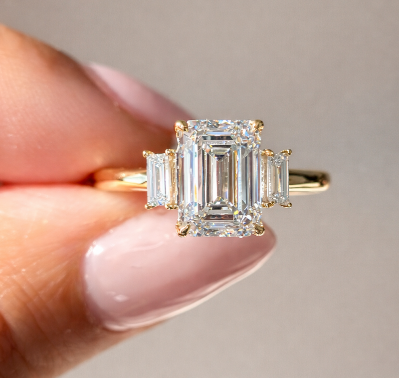 Yellow Gold Emerald Cut Three Stone Engagement Ring