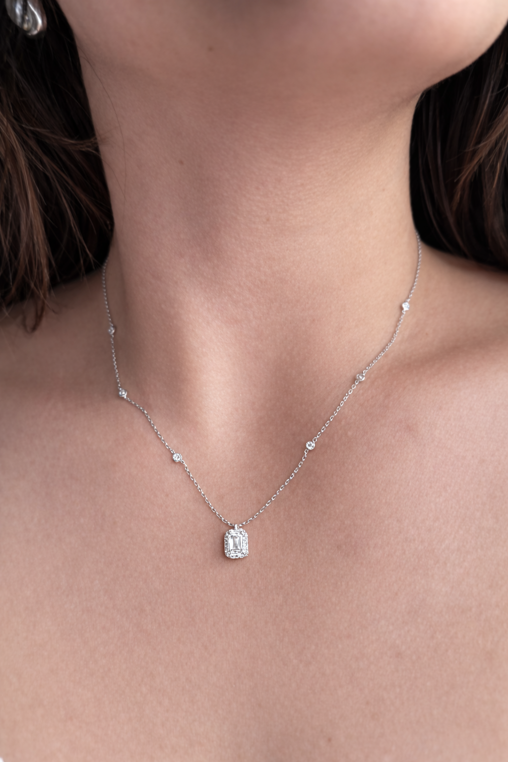0.74 Carats Halo Emerald Diamond Station Pendant